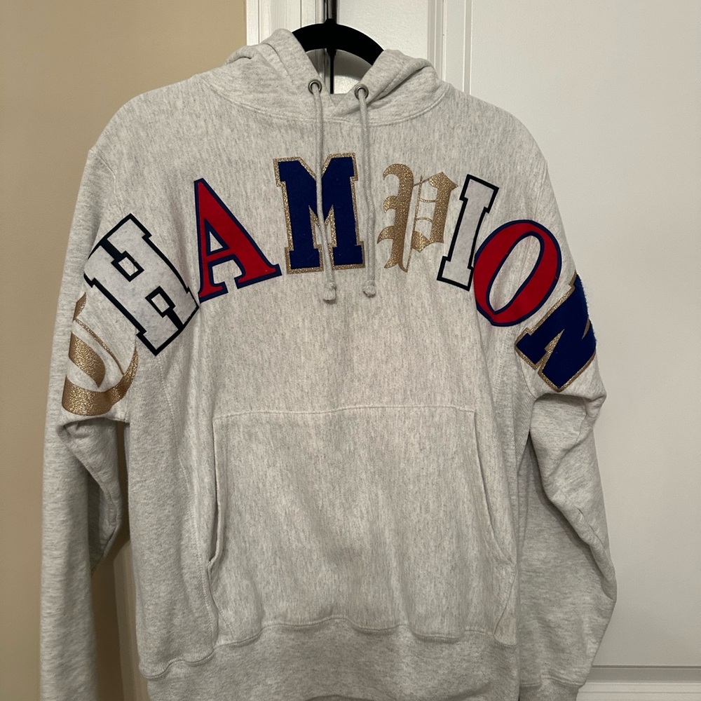 Champion Light Gray Hoodie with Red, Blue, and Gold Lettering